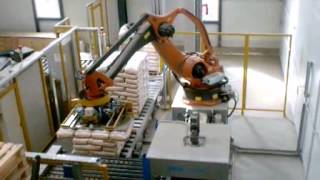 ROBOTEH palletizing solution  Wood pellet bags [upl. by Anilorak694]