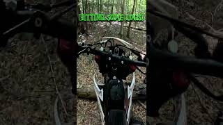 Hitting logs  AWD 250cc big wheel  ALL WHEEL DRIVE dirt bike  Christini AWD 250cc big wheel [upl. by Aloysia]