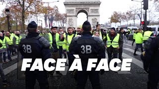 Les images des heurts entre gilets jaunes et police sur les ChampsElysées [upl. by Chappie]