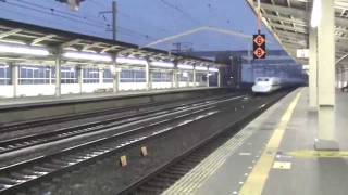 Shinkansen N700 passing NishiAkashi station at full speed [upl. by Placia]