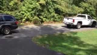 Jeep Grand Cherokee WJ 47 VS GMC Sierra 60 Tug of War [upl. by Nnyloj]