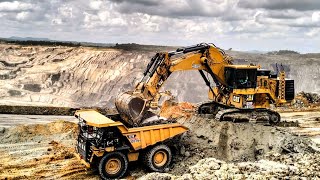 excavator cat 6020b loading truck for open pit mining [upl. by Simsar212]