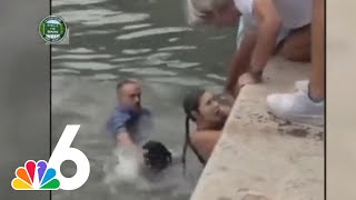 Intense confrontation after man allegedly REFUSED to let others rescue dog in water [upl. by Yrovi]