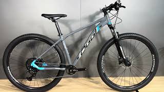 Bicicleta Oggi Big Wheel 70 2024 Shimano Cues GrafiteAzul [upl. by Arabela493]