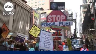 Climate change protesters hit the streets of New York [upl. by Ahsenrat507]