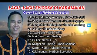 Lagu lagu Dusun yang Syiook di Karamaian  Norbert Servarios Cover [upl. by Stoddard]