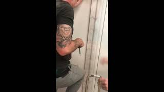 How to adjust sagging frameless door that’s hitting glass panel [upl. by Eikin]