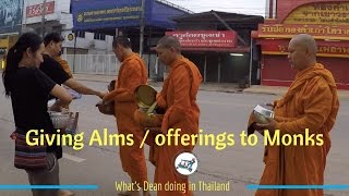 Giving Alms  offerings to Monks on the street in Thailand [upl. by Koller]