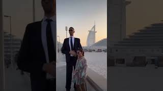 The tallest person in the World meets the Tallest building in the World 🌍🎥 [upl. by Orazio]