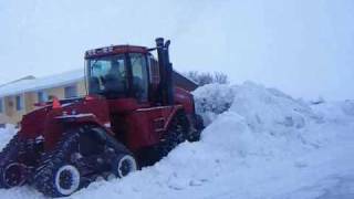 pushing snow case ih steiger stx535 quadtrac leon 4000 6 way blade [upl. by Anig748]