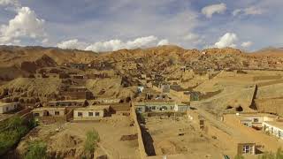 Bamyan city and Buddha of Bamyan seen from above [upl. by Mckale]