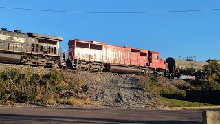 Westbound NS mixed manifest with Canadian Pacific behind leader and EOT DPU BNSF [upl. by Madelle]