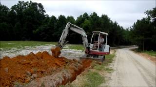 Trenching with the Mini Excavator [upl. by Ecirtnas]