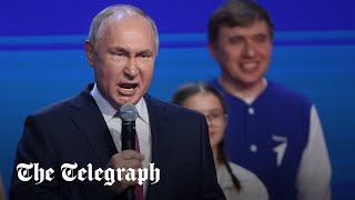 Putin awkwardly joins schoolchildren in singing national anthem [upl. by Wendelina]