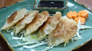 How to Make Potstickers  Easy Recipe 如何料理鍋貼） [upl. by Boonie764]