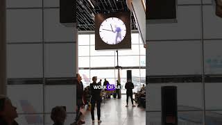 Man in the clock  Amsterdam Airport Schiphol [upl. by Harmaning]