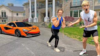 Worlds Strongest Man VS my McLaren Supercar [upl. by Ahsenra875]