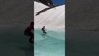 Alpine lake pond skim mountains snowboarding adventure [upl. by Pussej]