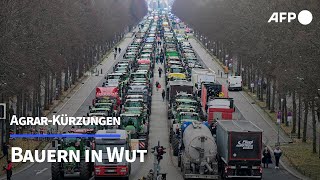 Tausende Bauern protestieren gegen AgrarKürzungen  AFP [upl. by Ainuj]