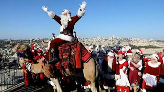 Touristen feiern orthodoxes Weihnachtsfest in Israel  AFP [upl. by Reteid]