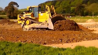 CAT D8 dozer at work pushing gravel for road construction [upl. by Lorianna]