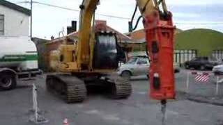 Excavadora con Martillo Hidraulico [upl. by Cuttler]