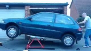 MINI TILTING CAR LIFT CL03 SUPPLIED BY CJ AUTOS [upl. by Elizabeth563]