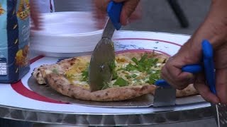 Pizza lovers celebrate Naples most famous gastronomic creation [upl. by Atilrac]