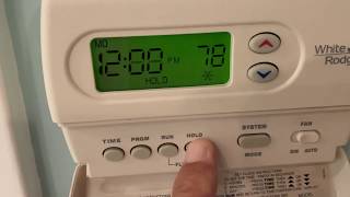 How to change the batteries in a White Rodgers thermostat [upl. by Hachmin]