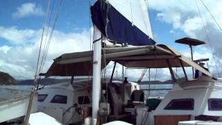 Tangaroa wharram catamaran Motor sailing in the rain [upl. by Iew880]