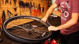 How to Put on New Bike Tire amp Tube  Bicycle Repair [upl. by Evangelina]