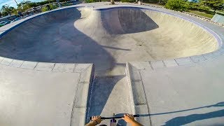 SCOOTER TRICKS ON GIANT SKATEPARK BOWL [upl. by Ahsela129]