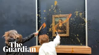 Moment protesters throw soup at Mona Lisa painting in Paris [upl. by Betty]