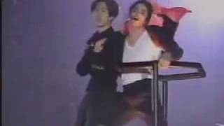 Korean fan jumps onto crane with Michael Jackson during Earth Song [upl. by Sidras]