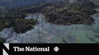 Water breaches dam on Chilcotin River [upl. by Mclain]