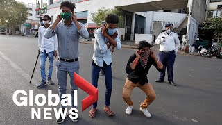 Coronavirus outbreak Indian police punish lockdown offenders with violence pushups [upl. by Schober232]