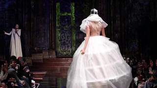 Model in wedding dress FALLS during Sheguang Hu FallWinter 2017 fashion show NYFW [upl. by Mussman58]