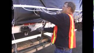 Flatbed 101 How to Tarp A Load Part 5  Tarp Tie Down [upl. by Dnomyar900]