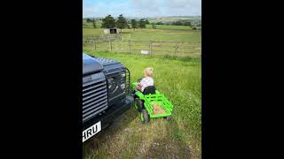 Little man on his tractor [upl. by Ilehs]