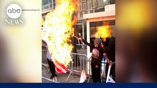 2 men sought for burning American flag and Israeli flag outside NYC Consulate [upl. by Hum]