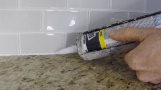 How To Install Caulk On A Kitchen Tile Backsplash [upl. by Karisa]