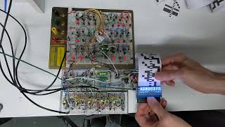 UsagiElectric UE01 Transistor version with optical paper tape reader doing 2 bit additions [upl. by Fiel]