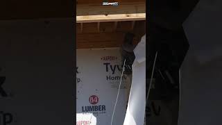 Wrapping The Framed House With Tyvek  Building A 350000 Custom House  Episode 17 Part 3 [upl. by Yahsan280]