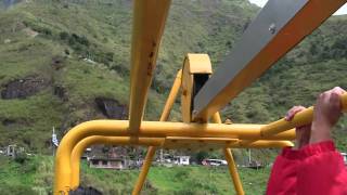 Riding Cable Car Across Waterfall Gorge in Banos Ecuador [upl. by Aramoiz]