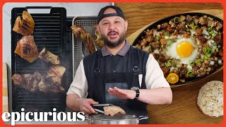 How A Filipino Chef Makes Traditional Pork Sisig  Passport Kitchen  Epicurious [upl. by Mosra]