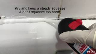 Applying the Unibond sealant in the bath [upl. by Merill]