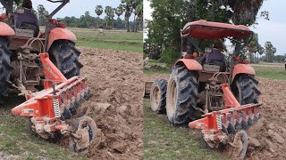 Plowing Field With Kubota M6040SU Tractor And Disc [upl. by Aitsirk41]