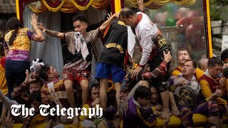 Millions of Filipinos swarm statue of Jesus for Black Nazarene procession [upl. by Labors996]