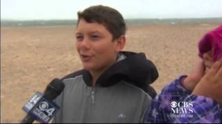 Hurricane Sandy Kids play on beach in storms path [upl. by Emaj]