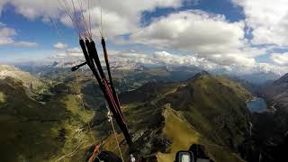 Dolomites paragliding Marmolada Piz Boe [upl. by Ylrebmik]